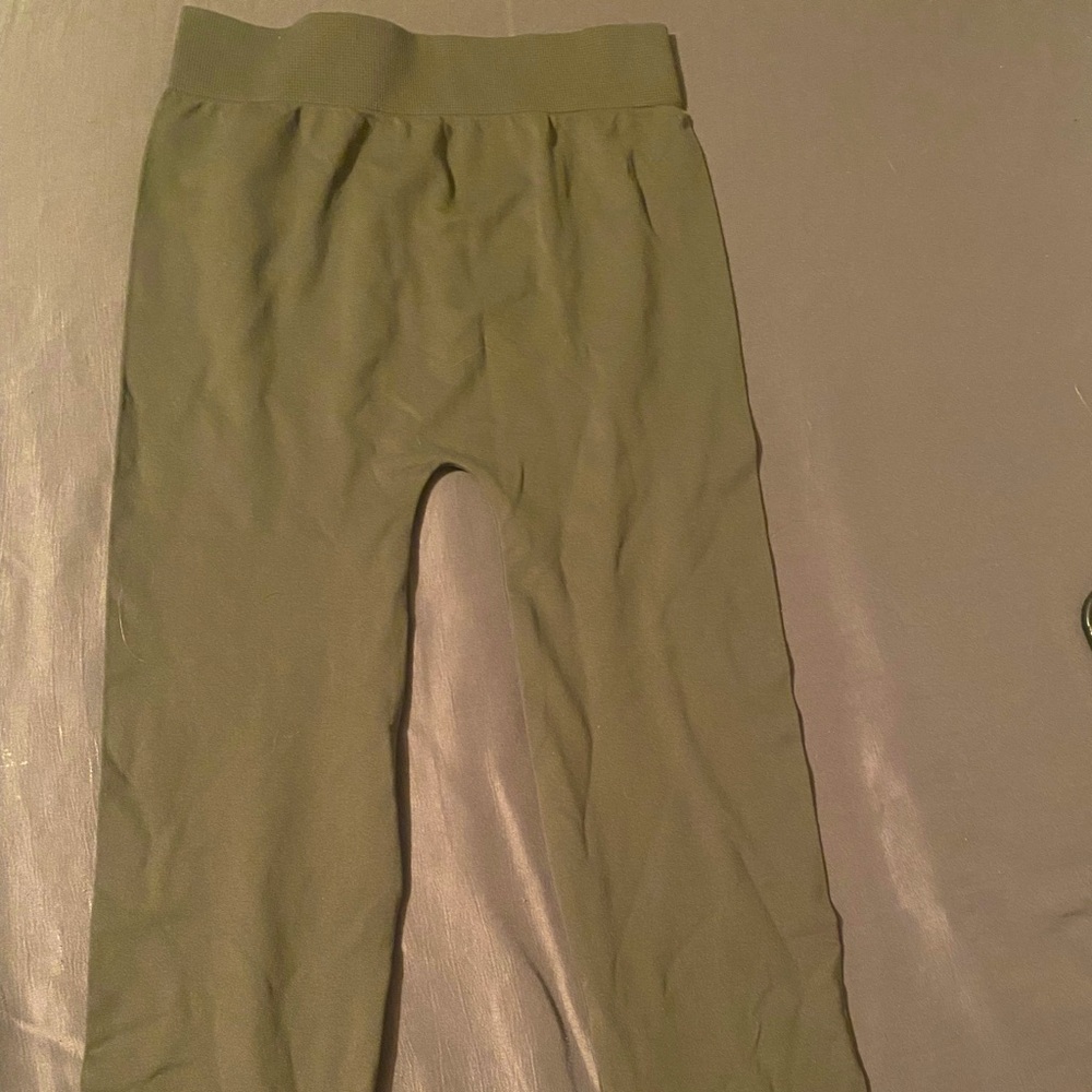 Green tight like pants.
